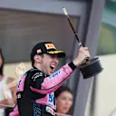 MONTE-CARLO, MONACO - MAY 28: Third placed Esteban Ocon of France and Alpine F1 celebrates on the podium during the F1 Grand Prix of Monaco at Circuit de Monaco on May 28, 2023 in Monte-Carlo, Monaco. (Photo by Bryn Lennon - Formula 1/Formula 1 via Getty Images)