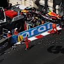 MONTE-CARLO, MONACO - MAY 27: The car of Sergio Perez of Mexico and Oracle Red Bull Racing is removed from the circuit by a crane after he crashed during qualifying ahead of the F1 Grand Prix of Monaco at Circuit de Monaco on May 27, 2023 in Monte-Carlo, Monaco. (Photo by Bryn Lennon - Formula 1/Formula 1 via Getty Images)