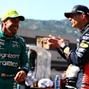 MONTE-CARLO, MONACO - MAY 27: Pole position qualifier Max Verstappen of the Netherlands and Oracle Red Bull Racing and Second placed qualifier Fernando Alonso of Spain and Aston Martin F1 Team talk in parc ferme during qualifying ahead of the F1 Grand Prix of Monaco at Circuit de Monaco on May 27, 2023 in Monte-Carlo, Monaco. (Photo by Mark Thompson/Getty Images)