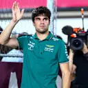 LUSAIL CITY, QATAR - OCTOBER 08: Lance Stroll of Canada and Aston Martin F1 Team waves to the crowd on the drivers parade prior to the F1 Grand Prix of Qatar at Lusail International Circuit on October 08, 2023 in Lusail City, Qatar. (Photo by Clive Rose/Getty Images)