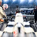LUSAIL CITY, QATAR - OCTOBER 08: Liam Lawson of New Zealand and Scuderia AlphaTauri prepares to drive in the garage prior to the F1 Grand Prix of Qatar at Lusail International Circuit on October 08, 2023 in Lusail City, Qatar. (Photo by Rudy Carezzevoli/Getty Images)