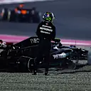 LUSAIL CITY, QATAR - OCTOBER 08: Lewis Hamilton of Great Britain and Mercedes looks on after retiring from the race during the F1 Grand Prix of Qatar at Lusail International Circuit on October 08, 2023 in Lusail City, Qatar. (Photo by Mark Thompson/Getty Images)