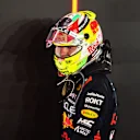 LUSAIL CITY, QATAR - OCTOBER 08: 10th placed Sergio Perez of Mexico and Oracle Red Bull Racing walks in parc ferme during the F1 Grand Prix of Qatar at Lusail International Circuit on October 08, 2023 in Lusail City, Qatar. (Photo by Clive Rose/Getty Images)