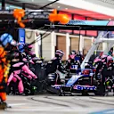 LUSAIL CITY, QATAR - OCTOBER 08: Esteban Ocon of France driving the (31) Alpine F1 A523 Renault makes a pitstop during the F1 Grand Prix of Qatar at Lusail International Circuit on October 08, 2023 in Lusail City, Qatar. (Photo by Dan Istitene - Formula 1/Formula 1 via Getty Images)