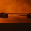 LUSAIL CITY, QATAR - OCTOBER 06: Nico Hulkenberg of Germany driving the (27) Haas F1 VF-23 Ferrari and Max Verstappen of the Netherlands driving the (1) Oracle Red Bull Racing RB19 on track during practice ahead of the F1 Grand Prix of Qatar at Lusail International Circuit on October 06, 2023 in Lusail City, Qatar. (Photo by Mark Thompson/Getty Images)