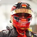 LUSAIL CITY, QATAR - OCTOBER 06: 12th placed qualifier Carlos Sainz of Spain and Ferrari walks in the Pitlane during qualifying ahead of the F1 Grand Prix of Qatar at Lusail International Circuit on October 06, 2023 in Lusail City, Qatar. (Photo by Dan Istitene - Formula 1/Formula 1 via Getty Images)