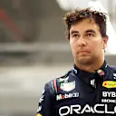 LUSAIL CITY, QATAR - OCTOBER 06: 13th placed qualifier Sergio Perez of Mexico and Oracle Red Bull Racing looks on in the FIA garage during qualifying ahead of the F1 Grand Prix of Qatar at Lusail International Circuit on October 06, 2023 in Lusail City, Qatar. (Photo by Dan Istitene - Formula 1/Formula 1 via Getty Images)