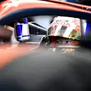 LUSAIL CITY, QATAR - OCTOBER 06: Yuki Tsunoda of Japan and Scuderia AlphaTauri prepares to drive in the garage during qualifying ahead of the F1 Grand Prix of Qatar at Lusail International Circuit on October 06, 2023 in Lusail City, Qatar. (Photo by Rudy Carezzevoli/Getty Images)