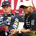 LUSAIL CITY, QATAR - OCTOBER 06: Third placed qualifier Lewis Hamilton of Great Britain and Mercedes and Pole position qualifier Max Verstappen of the Netherlands and Oracle Red Bull Racing attend the press conference after qualifying ahead of the F1 Grand Prix of Qatar at Lusail International Circuit on October 06, 2023 in Lusail City, Qatar. (Photo by Clive Mason/Getty Images)