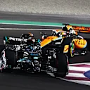 LUSAIL CITY, QATAR - OCTOBER 07: George Russell of Great Britain driving the (63) Mercedes AMG Petronas F1 Team W14 leads Oscar Piastri of Australia driving the (81) McLaren MCL60 Mercedes  during the Sprint ahead of the F1 Grand Prix of Qatar at Lusail International Circuit on October 07, 2023 in Lusail City, Qatar. (Photo by Clive Rose/Getty Images)