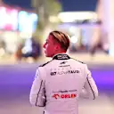 LUSAIL CITY, QATAR - OCTOBER 07: Liam Lawson of New Zealand and Scuderia AlphaTauri walks in the Paddock after retiring from the race during the Sprint ahead of the F1 Grand Prix of Qatar at Lusail International Circuit on October 07, 2023 in Lusail City, Qatar. (Photo by Dan Istitene - Formula 1/Formula 1 via Getty Images)