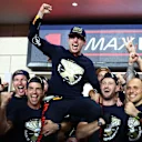 LUSAIL CITY, QATAR - OCTOBER 07: 2023 F1 World Drivers Champion Max Verstappen of the Netherlands and Oracle Red Bull Racing celebrates with his team in the Pitlane after the Sprint ahead of the F1 Grand Prix of Qatar at Lusail International Circuit on October 07, 2023 in Lusail City, Qatar. (Photo by Clive Rose/Getty Images)