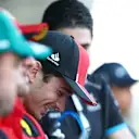 JEDDAH, SAUDI ARABIA - MARCH 19: Charles Leclerc of Monaco and Ferrari laughs on the drivers parade prior to the F1 Grand Prix of Saudi Arabia at Jeddah Corniche Circuit on March 19, 2023 in Jeddah, Saudi Arabia. (Photo by Dan Istitene - Formula 1/Formula 1 via Getty Images)