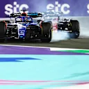 JEDDAH, SAUDI ARABIA - MARCH 19: Alexander Albon of Thailand driving the (23) Williams FW45 Mercedes locks a wheel under braking in front of Valtteri Bottas of Finland driving the (77) Alfa Romeo F1 C43 Ferrari during the F1 Grand Prix of Saudi Arabia at Jeddah Corniche Circuit on March 19, 2023 in Jeddah, Saudi Arabia. (Photo by Dan Istitene - Formula 1/Formula 1 via Getty Images)