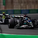 JEDDAH, SAUDI ARABIA - MARCH 19: George Russell of Great Britain driving the (63) Mercedes AMG Petronas F1 Team W14 leads Lewis Hamilton of Great Britain and Mercedes during the F1 Grand Prix of Saudi Arabia at Jeddah Corniche Circuit on March 19, 2023 in Jeddah, Saudi Arabia. (Photo by Bryn Lennon - Formula 1/Formula 1 via Getty Images)