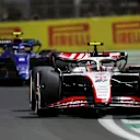 JEDDAH, SAUDI ARABIA - MARCH 19: Nico Hulkenberg of Germany driving the (27) Haas F1 VF-23 Ferrari leads Logan Sargeant of United States driving the (2) Williams FW45 Mercedes during the F1 Grand Prix of Saudi Arabia at Jeddah Corniche Circuit on March 19, 2023 in Jeddah, Saudi Arabia. (Photo by Peter Fox/Getty Images)