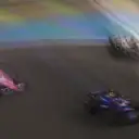 JEDDAH, SAUDI ARABIA - MARCH 19: Logan Sargeant of United States driving the (2) Williams FW45 Mercedes leads Esteban Ocon of France driving the (31) Alpine F1 A523 Renault and Yuki Tsunoda of Japan driving the (22) Scuderia AlphaTauri AT04 during the F1 Grand Prix of Saudi Arabia at Jeddah Corniche Circuit on March 19, 2023 in Jeddah, Saudi Arabia. (Photo by Lars Baron/Getty Images)