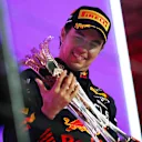 JEDDAH, SAUDI ARABIA - MARCH 19: Race winner Sergio Perez of Mexico and Oracle Red Bull Racing celebrates on the podium during the F1 Grand Prix of Saudi Arabia at Jeddah Corniche Circuit on March 19, 2023 in Jeddah, Saudi Arabia. (Photo by Joe Portlock - Formula 1/Formula 1 via Getty Images)