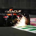 JEDDAH, SAUDI ARABIA - MARCH 17: Sparks fly behind Max Verstappen of the Netherlands driving the (1) Oracle Red Bull Racing RB19 during practice ahead of the F1 Grand Prix of Saudi Arabia at Jeddah Corniche Circuit on March 17, 2023 in Jeddah, Saudi Arabia. (Photo by Clive Mason/Getty Images)