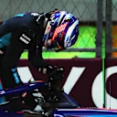 JEDDAH, SAUDI ARABIA - MARCH 18: Logan Sargeant of United States and Williams climbs from his car during qualifying ahead of the F1 Grand Prix of Saudi Arabia at Jeddah Corniche Circuit on March 18, 2023 in Jeddah, Saudi Arabia. (Photo by Bryn Lennon - Formula 1/Formula 1 via Getty Images)