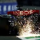 JEDDAH, SAUDI ARABIA - MARCH 18: Sparks fly behind George Russell of Great Britain driving the (63) Mercedes AMG Petronas F1 Team W14 during qualifying ahead of the F1 Grand Prix of Saudi Arabia at Jeddah Corniche Circuit on March 18, 2023 in Jeddah, Saudi Arabia. (Photo by Bryn Lennon - Formula 1/Formula 1 via Getty Images)