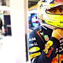 JEDDAH, SAUDI ARABIA - MARCH 18: Sergio Perez of Mexico and Oracle Red Bull Racing prepares to drive in the garage during qualifying ahead of the F1 Grand Prix of Saudi Arabia at Jeddah Corniche Circuit on March 18, 2023 in Jeddah, Saudi Arabia. (Photo by Mark Thompson/Getty Images)