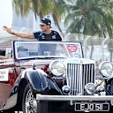 SINGAPORE, SINGAPORE - SEPTEMBER 17: Esteban Ocon of France and Alpine F1 waves to the crowd on the drivers parade prior to the F1 Grand Prix of Singapore at Marina Bay Street Circuit on September 17, 2023 in Singapore, Singapore. (Photo by Mark Thompson/Getty Images)