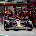SINGAPORE, SINGAPORE - SEPTEMBER 17: Max Verstappen of the Netherlands driving the (1) Oracle Red Bull Racing RB19 makes a pitstop during the F1 Grand Prix of Singapore at Marina Bay Street Circuit on September 17, 2023 in Singapore, Singapore. (Photo by Clive Rose/Getty Images)