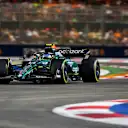 SINGAPORE, SINGAPORE - SEPTEMBER 17: Fernando Alonso of Spain driving the (14) Aston Martin AMR23 Mercedes on track during the F1 Grand Prix of Singapore at Marina Bay Street Circuit on September 17, 2023 in Singapore, Singapore. (Photo by Rudy Carezzevoli/Getty Images)