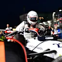 SINGAPORE, SINGAPORE - SEPTEMBER 17: Yuki Tsunoda of Japan and Scuderia AlphaTauri prepares to drive on the grid during the F1 Grand Prix of Singapore at Marina Bay Street Circuit on September 17, 2023 in Singapore, Singapore. (Photo by Rudy Carezzevoli/Getty Images)