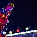 SINGAPORE, SINGAPORE - SEPTEMBER 17: Race winner Carlos Sainz of Spain and Ferrari celebrates on the podium during the F1 Grand Prix of Singapore at Marina Bay Street Circuit on September 17, 2023 in Singapore, Singapore. (Photo by Dan Istitene - Formula 1/Formula 1 via Getty Images)