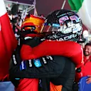 SINGAPORE, SINGAPORE - SEPTEMBER 17: Race winner Carlos Sainz of Spain and Ferrari and Second placed Lando Norris of Great Britain and McLaren celebrate in parc ferme during the F1 Grand Prix of Singapore at Marina Bay Street Circuit on September 17, 2023 in Singapore, Singapore. (Photo by Dan Istitene - Formula 1/Formula 1 via Getty Images)