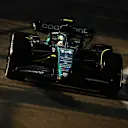 SINGAPORE, SINGAPORE - SEPTEMBER 15: Fernando Alonso of Spain driving the (14) Aston Martin AMR23 Mercedes on track during practice ahead of the F1 Grand Prix of Singapore at Marina Bay Street Circuit on September 15, 2023 in Singapore, Singapore. (Photo by Clive Mason/Getty Images)