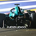 SINGAPORE, SINGAPORE - SEPTEMBER 16: Lance Stroll of Canada and Aston Martin F1 Team sits in his car after crashing on track during qualifying ahead of the F1 Grand Prix of Singapore at Marina Bay Street Circuit on September 16, 2023 in Singapore, Singapore. (Photo by Mark Thompson/Getty Images)