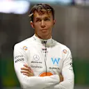 SINGAPORE, SINGAPORE - SEPTEMBER 16: Alexander Albon of Thailand and Williams looks on in the Pitlane during a red flag period during qualifying ahead of the F1 Grand Prix of Singapore at Marina Bay Street Circuit on September 16, 2023 in Singapore, Singapore. (Photo by Bryn Lennon - Formula 1/Formula 1 via Getty Images)