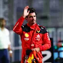 SINGAPORE, SINGAPORE - SEPTEMBER 16: Pole position qualifier Carlos Sainz of Spain and Ferrari celebrates in parc ferme during qualifying ahead of the F1 Grand Prix of Singapore at Marina Bay Street Circuit on September 16, 2023 in Singapore, Singapore. (Photo by Bryn Lennon - Formula 1/Formula 1 via Getty Images)
