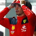SINGAPORE, SINGAPORE - SEPTEMBER 16: Third placed qualifier Charles Leclerc of Monaco and Ferrari looks on in parc ferme during qualifying ahead of the F1 Grand Prix of Singapore at Marina Bay Street Circuit on September 16, 2023 in Singapore, Singapore. (Photo by Mark Thompson/Getty Images)