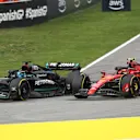 BARCELONA, SPAIN - JUNE 04: George Russell of Great Britain driving the (63) Mercedes AMG Petronas F1 Team W14 leads Carlos Sainz of Spain driving (55) the Ferrari SF-23 on track during the F1 Grand Prix of Spain at Circuit de Barcelona-Catalunya on June 04, 2023 in Barcelona, Spain. (Photo by Joe Portlock - Formula 1/Formula 1 via Getty Images)