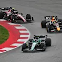 BARCELONA, SPAIN - JUNE 04: Fernando Alonso of Spain driving the (14) Aston Martin AMR23 Mercedes leads Sergio Perez of Mexico driving the (11) Oracle Red Bull Racing RB19 and Zhou Guanyu of China driving the (24) Alfa Romeo F1 C43 Ferrari on track during the F1 Grand Prix of Spain at Circuit de Barcelona-Catalunya on June 04, 2023 in Barcelona, Spain. (Photo by Dan Mullan - Formula 1/Formula 1 via Getty Images)