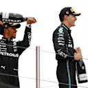 BARCELONA, SPAIN - JUNE 04: Second placed Lewis Hamilton of Great Britain and Mercedes and Third placed George Russell of Great Britain driving the (63) Mercedes AMG Petronas F1 Team W14 celebrate on the podium during the F1 Grand Prix of Spain at Circuit de Barcelona-Catalunya on June 04, 2023 in Barcelona, Spain. (Photo by David Ramos/Getty Images)