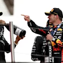 BARCELONA, SPAIN - JUNE 04: Race Winner Max Verstappen of the Netherlands and Oracle Red Bull Racing and Second placed Lewis Hamilton of Great Britain and Mercedes celebrate on the podium during the F1 Grand Prix of Spain at Circuit de Barcelona-Catalunya on June 04, 2023 in Barcelona, Spain. (Photo by David Ramos/Getty Images)