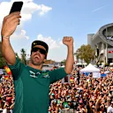BARCELONA, SPAIN - JUNE 02: Fernando Alonso of Spain and Aston Martin F1 Team takes a photo from the fan stage prior to practice ahead of the F1 Grand Prix of Spain at Circuit de Barcelona-Catalunya on June 02, 2023 in Barcelona, Spain. (Photo by Dan Mullan - Formula 1/Formula 1 via Getty Images)