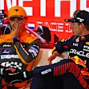 ZANDVOORT, NETHERLANDS - AUGUST 26: Pole position qualifier Max Verstappen of the Netherlands and Oracle Red Bull Racing (R), Second placed qualifier Lando Norris of Great Britain and McLaren (L) and attend the press conference after qualifying ahead of the F1 Grand Prix of The Netherlands at Circuit Zandvoort on August 26, 2023 in Zandvoort, Netherlands. (Photo by Bryn Lennon/Getty Images)