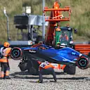 ZANDVOORT, NETHERLANDS - AUGUST 26: The car of Logan Sargeant of United States and Williams is removed from the track after he crashed during qualifying ahead of the F1 Grand Prix of The Netherlands at Circuit Zandvoort on August 26, 2023 in Zandvoort, Netherlands. (Photo by Peter Fox/Getty Images)