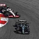 AUSTIN, TEXAS - OCTOBER 22: Fernando Alonso of Spain driving the (14) Aston Martin AMR23 Mercedes leads Nico Hulkenberg of Germany driving the (27) Haas F1 VF-23 Ferrari during the F1 Grand Prix of United States at Circuit of The Americas on October 22, 2023 in Austin, Texas. (Photo by Jared C. Tilton - Formula 1/Formula 1 via Getty Images)