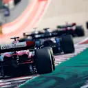 AUSTIN, TEXAS - OCTOBER 22: Valtteri Bottas of Finland driving the (77) Alfa Romeo F1 C43 Ferrari chases a line of cars during the F1 Grand Prix of United States at Circuit of The Americas on October 22, 2023 in Austin, Texas. (Photo by Chris Graythen/Getty Images)