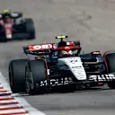 AUSTIN, TEXAS - OCTOBER 22: Yuki Tsunoda of Japan driving the (22) Scuderia AlphaTauri AT04 leads Zhou Guanyu of China driving the (24) Alfa Romeo F1 C43 Ferrari on track during the F1 Grand Prix of United States at Circuit of The Americas on October 22, 2023 in Austin, Texas. (Photo by Chris Graythen/Getty Images)