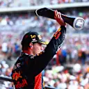 AUSTIN, TEXAS - OCTOBER 22: Race winner Max Verstappen of the Netherlands and Oracle Red Bull Racing celebrates on the podium following the F1 Grand Prix of United States at Circuit of The Americas on October 22, 2023 in Austin, Texas. (Photo by Dan Istitene - Formula 1/Formula 1 via Getty Images)