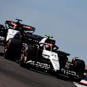 AUSTIN, TEXAS - OCTOBER 20: Yuki Tsunoda of Japan driving the (22) Scuderia AlphaTauri AT04 leads Daniel Ricciardo of Australia driving the (3) Scuderia AlphaTauri AT04 on track during practice ahead of the F1 Grand Prix of United States at Circuit of The Americas on October 20, 2023 in Austin, Texas. (Photo by Chris Graythen/Getty Images)