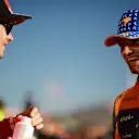 AUSTIN, TEXAS - OCTOBER 20: Pole position qualifier Charles Leclerc of Monaco and Ferrari talks with Second placed qualifier Lando Norris of Great Britain and McLaren in parc ferme after qualifying ahead of the F1 Grand Prix of United States at Circuit of The Americas on October 20, 2023 in Austin, Texas. (Photo by Mario Renzi - Formula 1/Formula 1 via Getty Images)